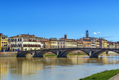 Embankment of arno river with ponte santa trinita, florence, italy