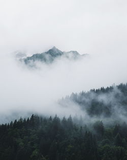 Scenic view of mountains during foggy weather