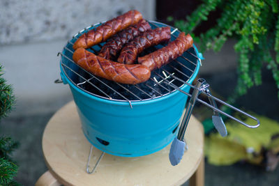 Close-up of meat on barbecue grill