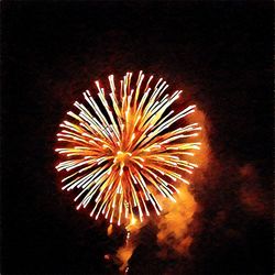 Low angle view of firework display at night