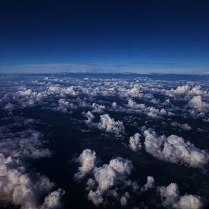 Aerial view of cloudscape against blue sky