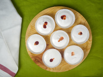 High angle view of cupcakes on table