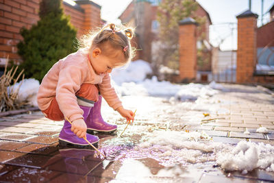 Portrait of cute girl playing in park