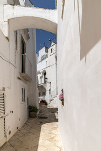 Alley amidst buildings in city