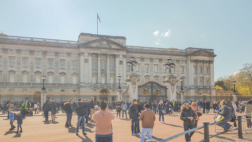 Group of people in front of historical building