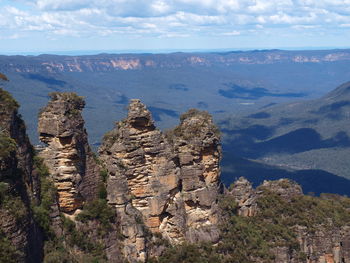 Panoramic view of rocky mountains against sky