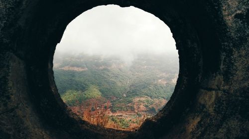 Landscape seen from hole in rock