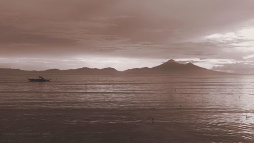 Boats sailing in sea