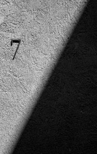 High angle view of shadow on wall