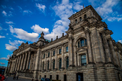 Low angle view of reichstag building against sky