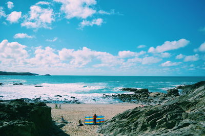 Scenic view of sea against cloudy sky