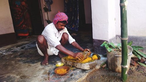 Full length of a man preparing food