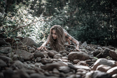 Surface level of woman in forest