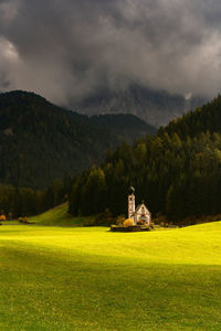 Scenic view of landscape and mountains against sky