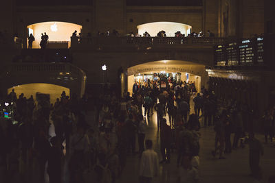 Crowd at night in city