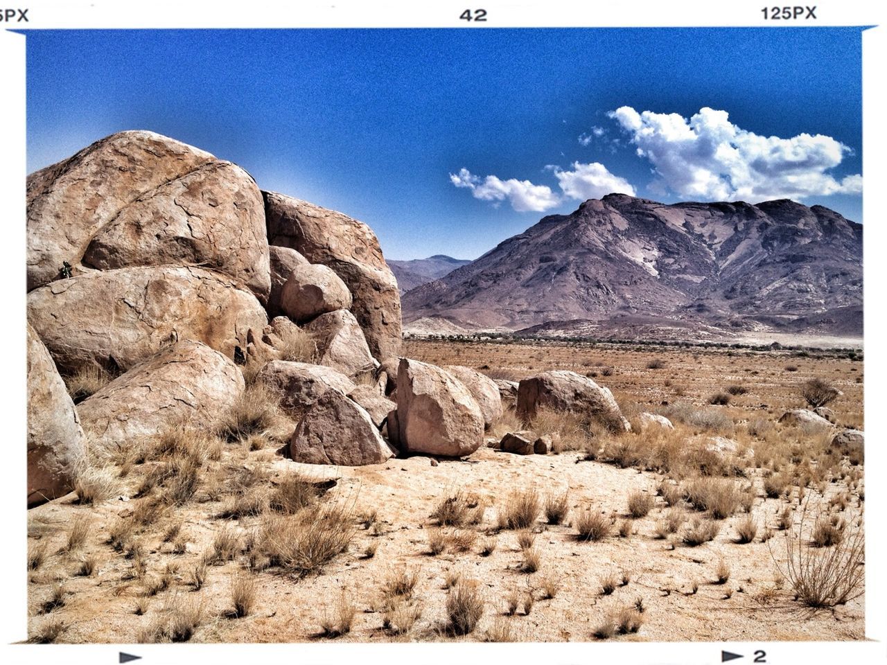 transfer print, mountain, auto post production filter, sky, mountain range, tranquil scene, tranquility, rock formation, landscape, rock - object, scenics, rock, nature, physical geography, blue, geology, beauty in nature, cloud, rocky mountains, arid climate