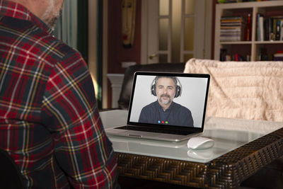 Friends video chat connection concept using a technology platform during quarantine isolation.