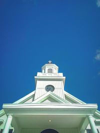 Low angle view of building against blue sky