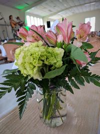 Close-up of flower vase on table