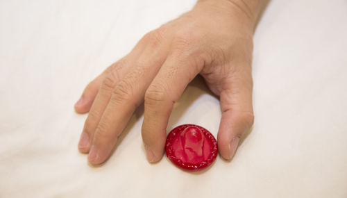 Close-up of hand on table