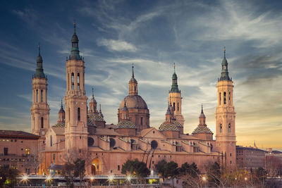Low angle view of buildings in city against sky