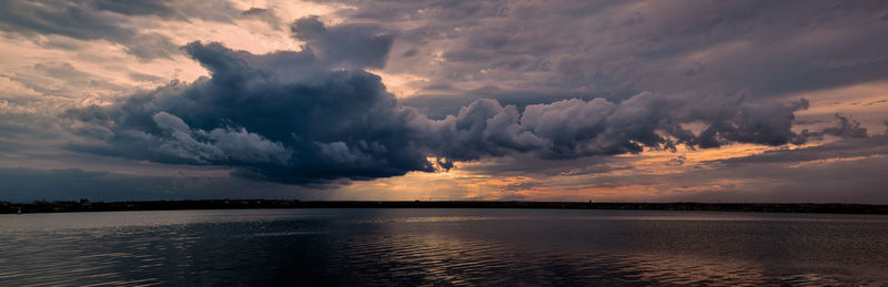 Panoramic view of sea against dramatic sky