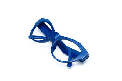 Close-up of eyeglasses against white background