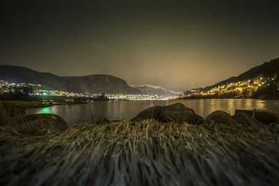 Scenic view of lake at night