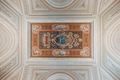 Low angle view of ornate ceiling