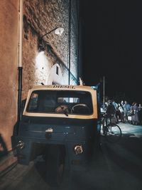 Cars parked on street at night