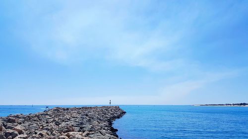 View of calm blue sea against sky