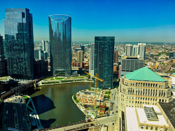 Modern buildings in city against sky