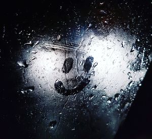 Close-up of raindrops on window