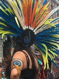 Woman with multi colored umbrella