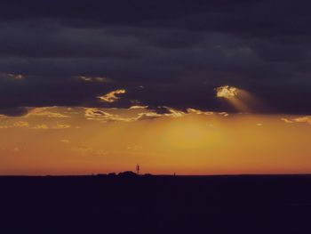 Scenic view of dramatic sky during sunset