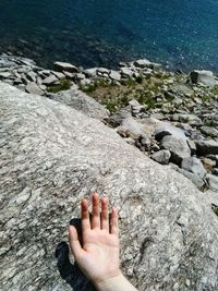High angle view of woman lying on beach