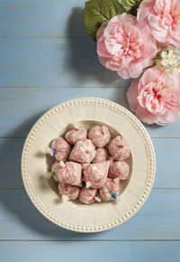 High angle view of pink flowers on table