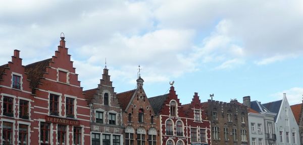 Front view of facades and sky
