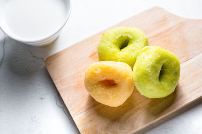 High angle view of apple on cutting board