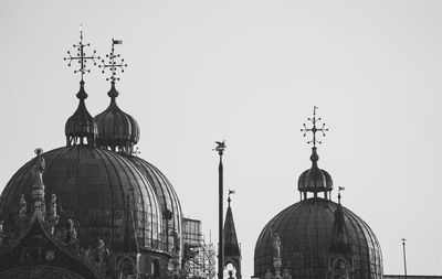 Low angle view of cathedral against buildings