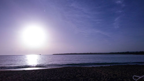 Scenic view of sea against sky at sunset