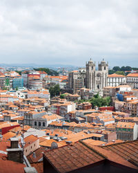 View of the orange tiled roofs of the ancient portuguese city of porto. urban landscape