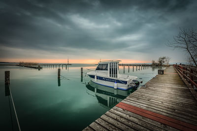 Pier on sea against sky