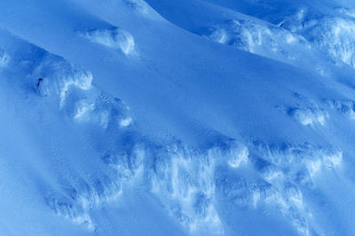 Full frame shot of snowcapped mountain against sky