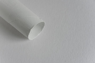 High angle view of white paper on table