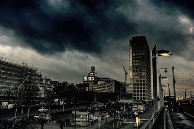 City street against cloudy sky