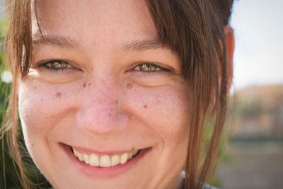 Close-up portrait of smiling woman