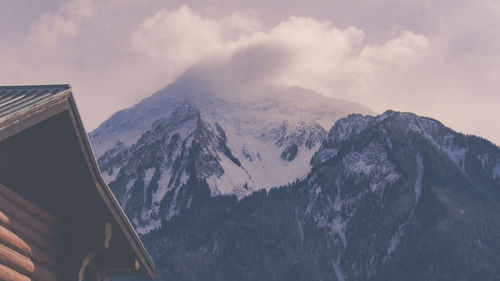 Scenic view of mountains against sky during winter