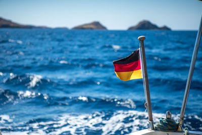 German sailboat on sea against blue sky