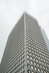 Low angle view of modern building against sky